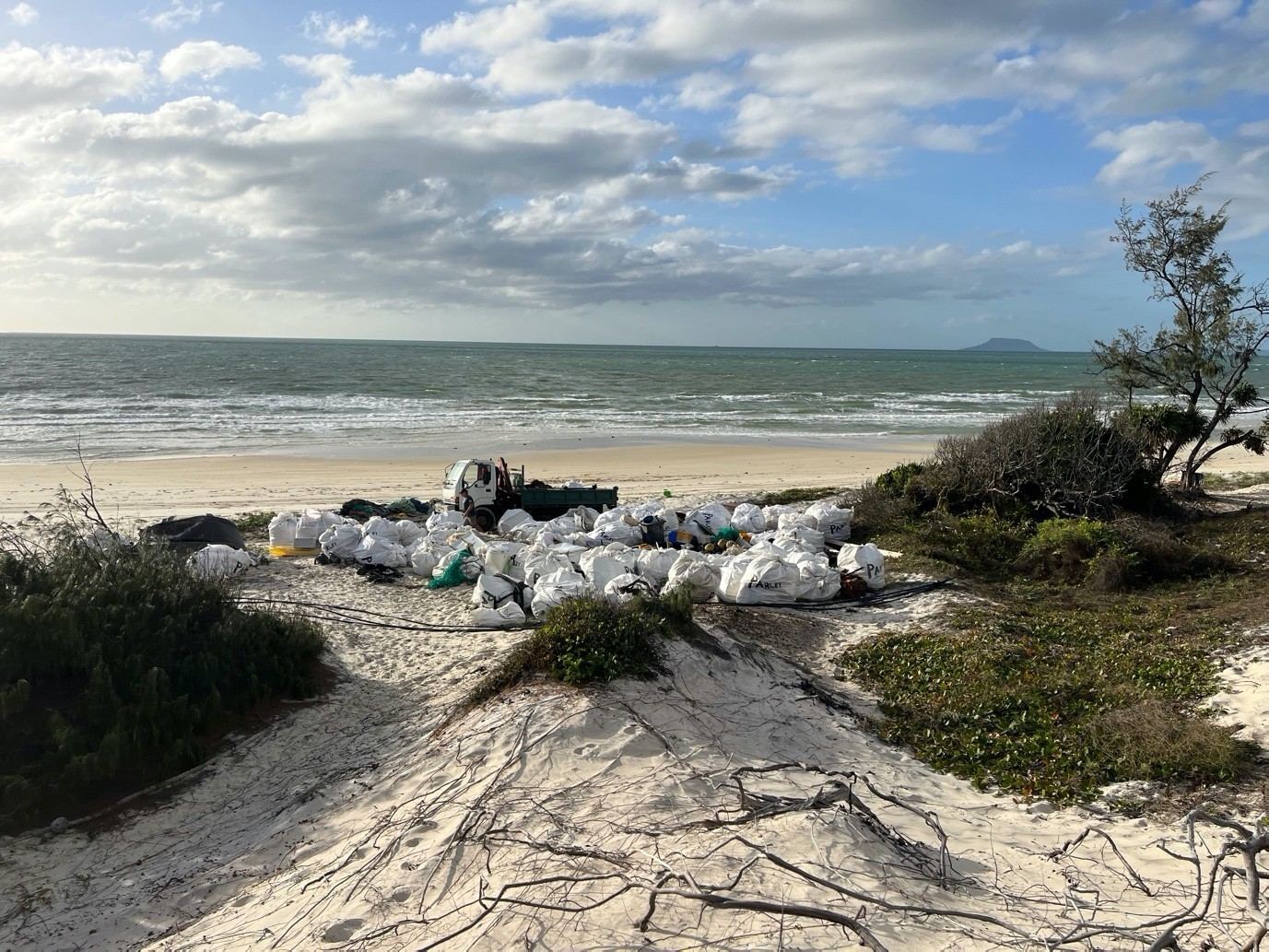 Bulk bags of plastic collected from a remote beach