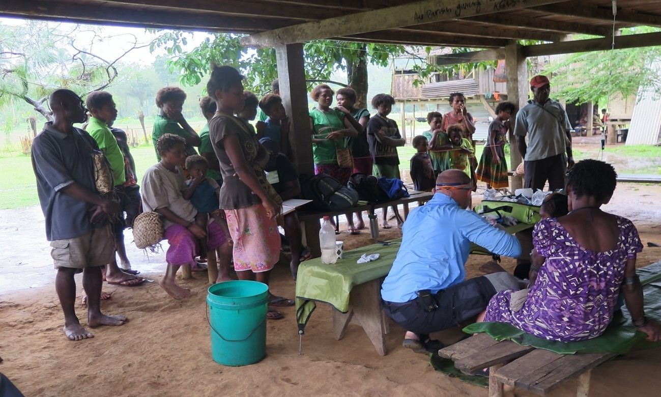 Plastics Pirate crew meeting with a Pacific Island community